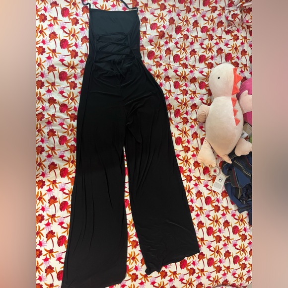 PRETTY LITTLE THINGS Strappy Back Flared Leg Jumpsuit - Picture 5 of 6